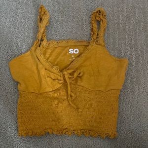 I’m selling a cropped SO shirt that is a orangey yellow color